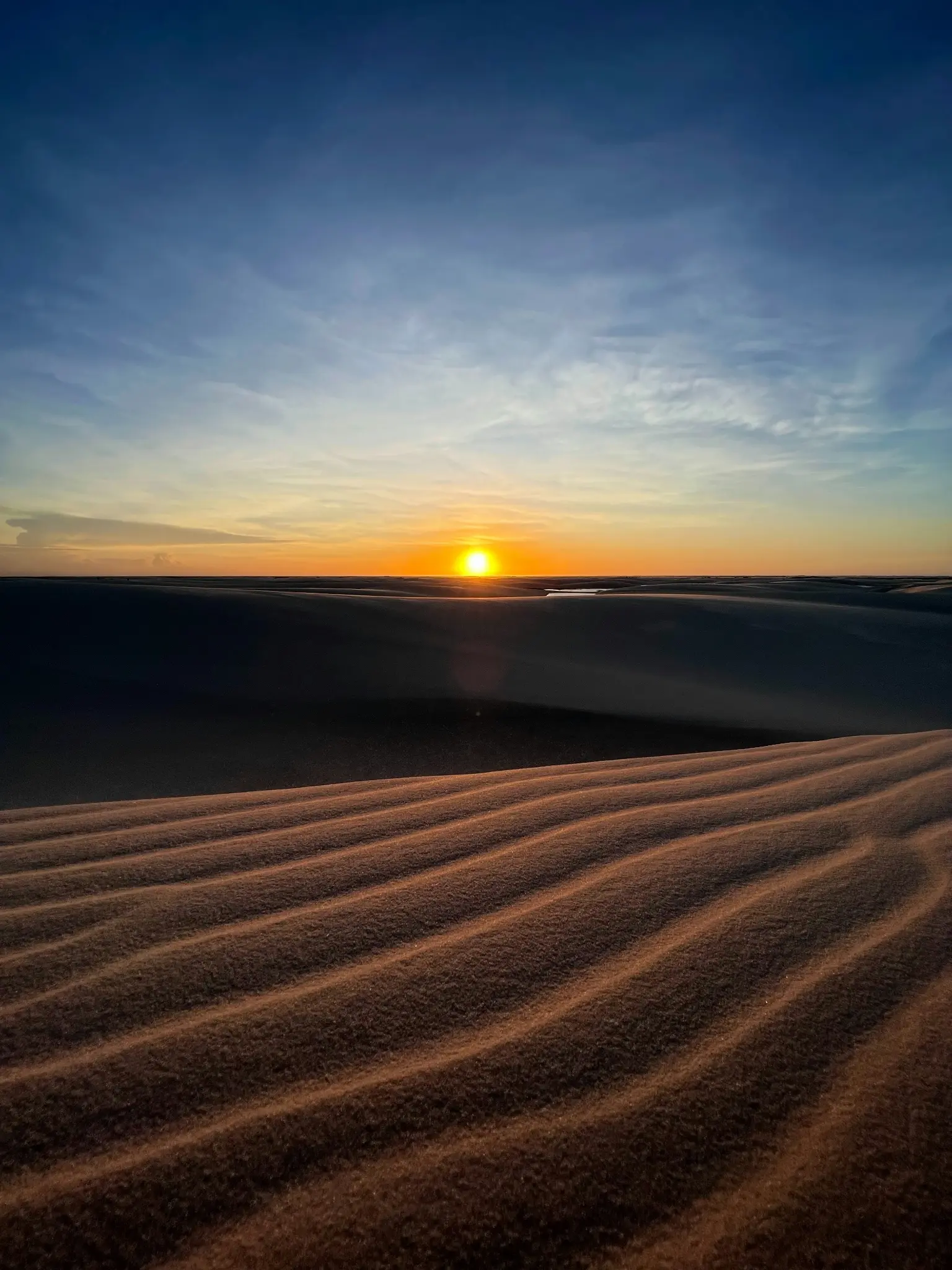 Golden sunset over the dunes of Lençóis Maranhenses